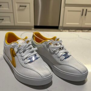 Skechers White Sneakers with Yellow Highlights